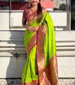 Lime green woven self design pure silk paithani saree with blouse