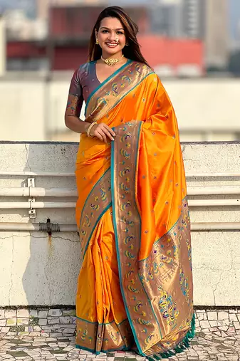 Orange woven self design pure silk paithani saree with blouse