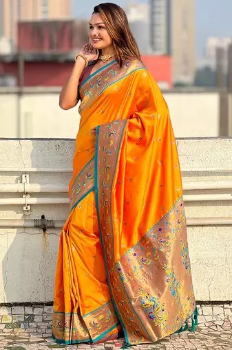 Orange woven self design pure silk paithani saree with blouse