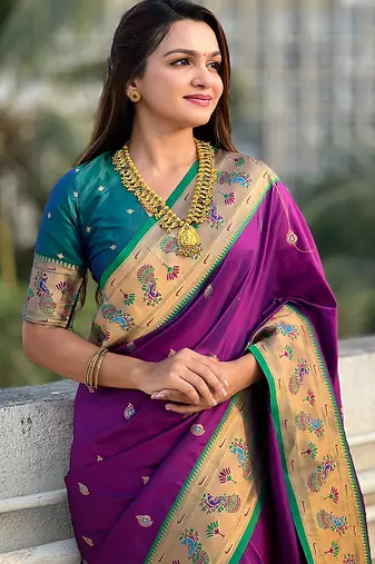 Purple woven self design pure silk paithani saree with blouse