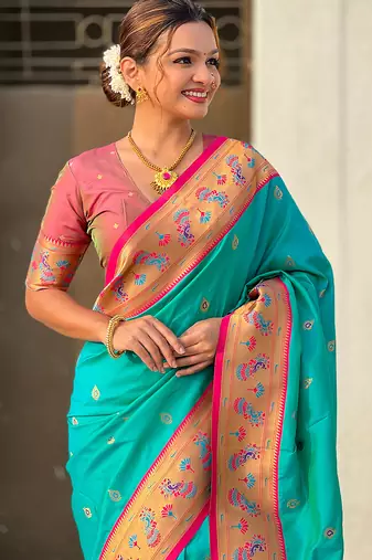 Sea green woven self design pure silk paithani saree with blouse
