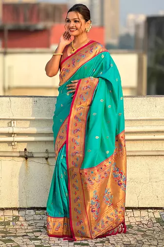 Sea green woven self design pure silk paithani saree with blouse