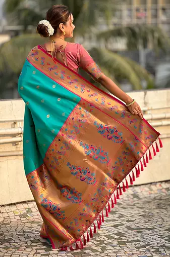 Sea green woven self design pure silk paithani saree with blouse