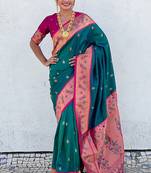 Teal green woven self design pure silk paithani saree with blouse