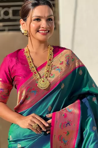 Teal green woven self design pure silk paithani saree with blouse