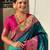 Teal green woven self design pure silk paithani saree with blouse