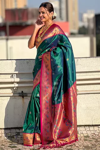 Teal green woven self design pure silk paithani saree with blouse