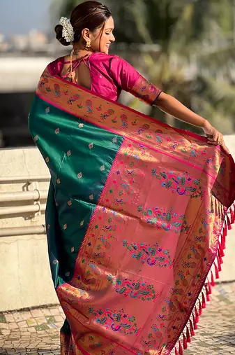Teal green woven self design pure silk paithani saree with blouse