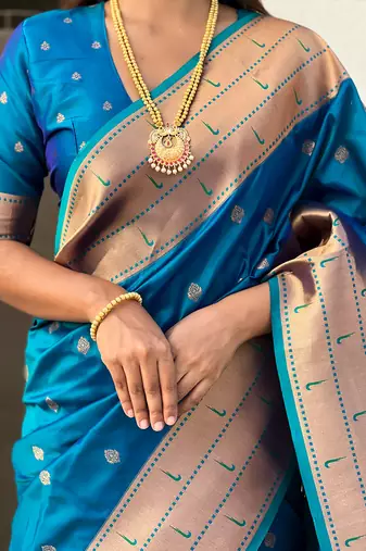 Blue woven self design pure silk paithani saree with blouse
