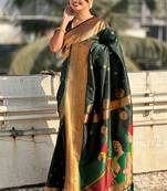 Dark green woven self design pure silk paithani saree with blouse