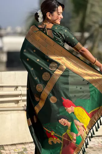 Dark green woven self design pure silk paithani saree with blouse