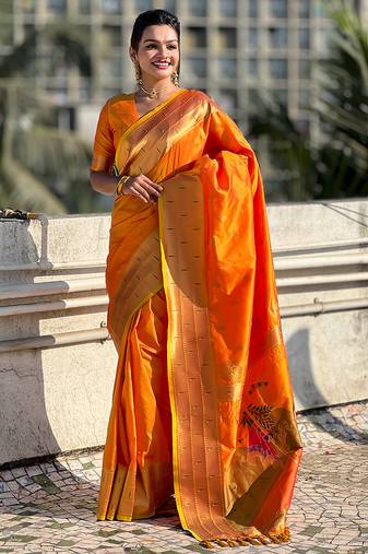 Orange woven self design pure silk paithani saree with blouse