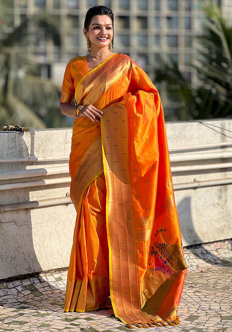 Orange woven self design pure silk paithani saree with blouse