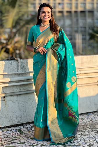 Sea green woven self design pure silk paithani saree with blouse