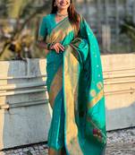 Sea green woven self design pure silk paithani saree with blouse