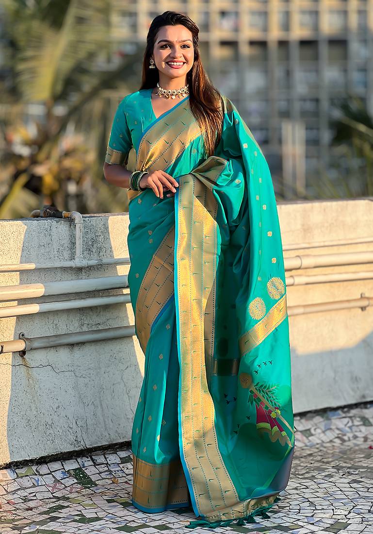 Sea green woven self design pure silk paithani saree with blouse