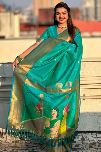 Sea green woven self design pure silk paithani saree with blouse
