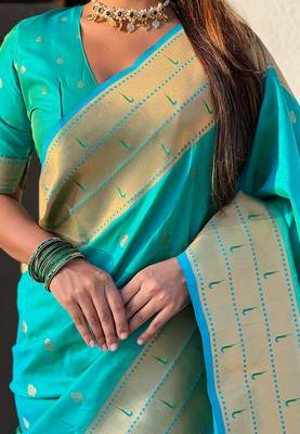 Sea green woven self design pure silk paithani saree with blouse 3