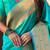 Sea green woven self design pure silk paithani saree with blouse