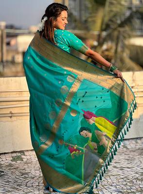 Sea green woven self design pure silk paithani saree with blouse 4