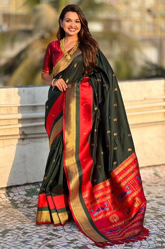 Dark green woven self design pure silk paithani saree with blouse