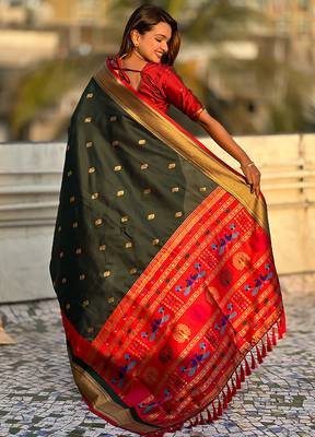 Dark green woven self design pure silk paithani saree with blouse 5