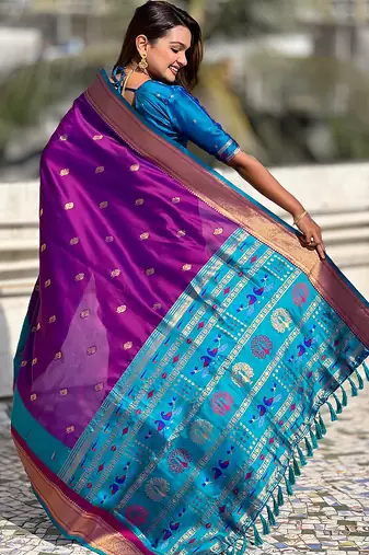 Magenta woven self design pure silk paithani saree with blouse