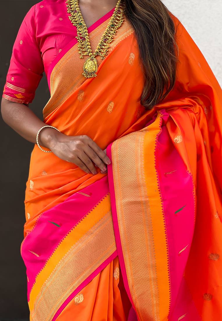 Orange woven self design pure silk paithani saree with blouse