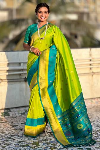 Parrot green woven self design pure silk paithani saree with blouse