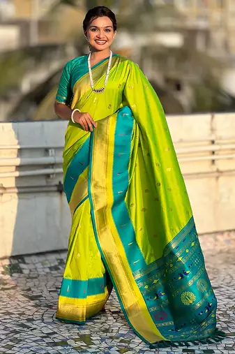 Parrot green woven self design pure silk paithani saree with blouse