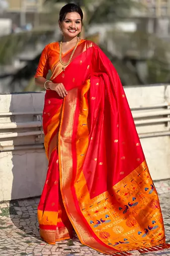 Red woven self design pure silk paithani saree with blouse