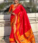 Red woven self design pure silk paithani saree with blouse