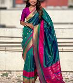 Teal green woven self design pure silk paithani saree with blouse
