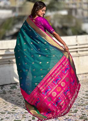 Teal green woven self design pure silk paithani saree with blouse 5