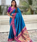 Blue woven self design pure silk paithani saree with blouse
