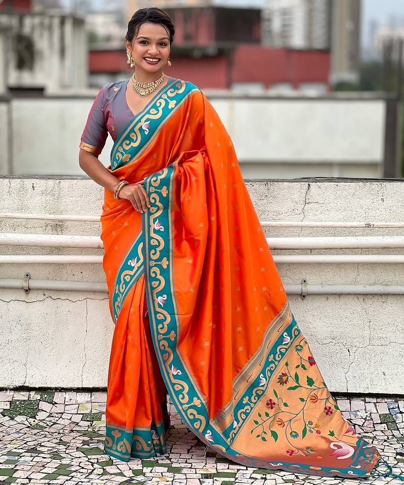 Orange woven self design pure silk paithani saree with blouse