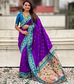 Purple woven self design pure silk paithani saree with blouse