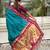 Teal blue magenta woven self design pure silk paithani saree with blouse