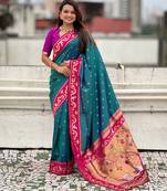 Teal blue pink woven self design pure silk paithani saree with blouse