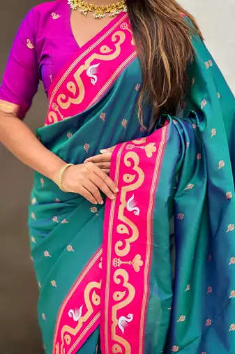 Teal blue pink woven self design pure silk paithani saree with blouse