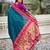 Teal blue pink woven self design pure silk paithani saree with blouse