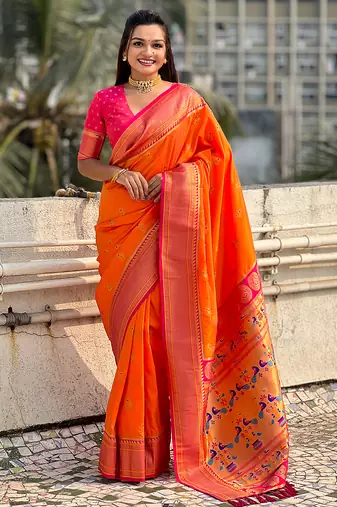 Orange woven self design pure silk paithani saree with blouse