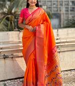 Orange woven self design pure silk paithani saree with blouse