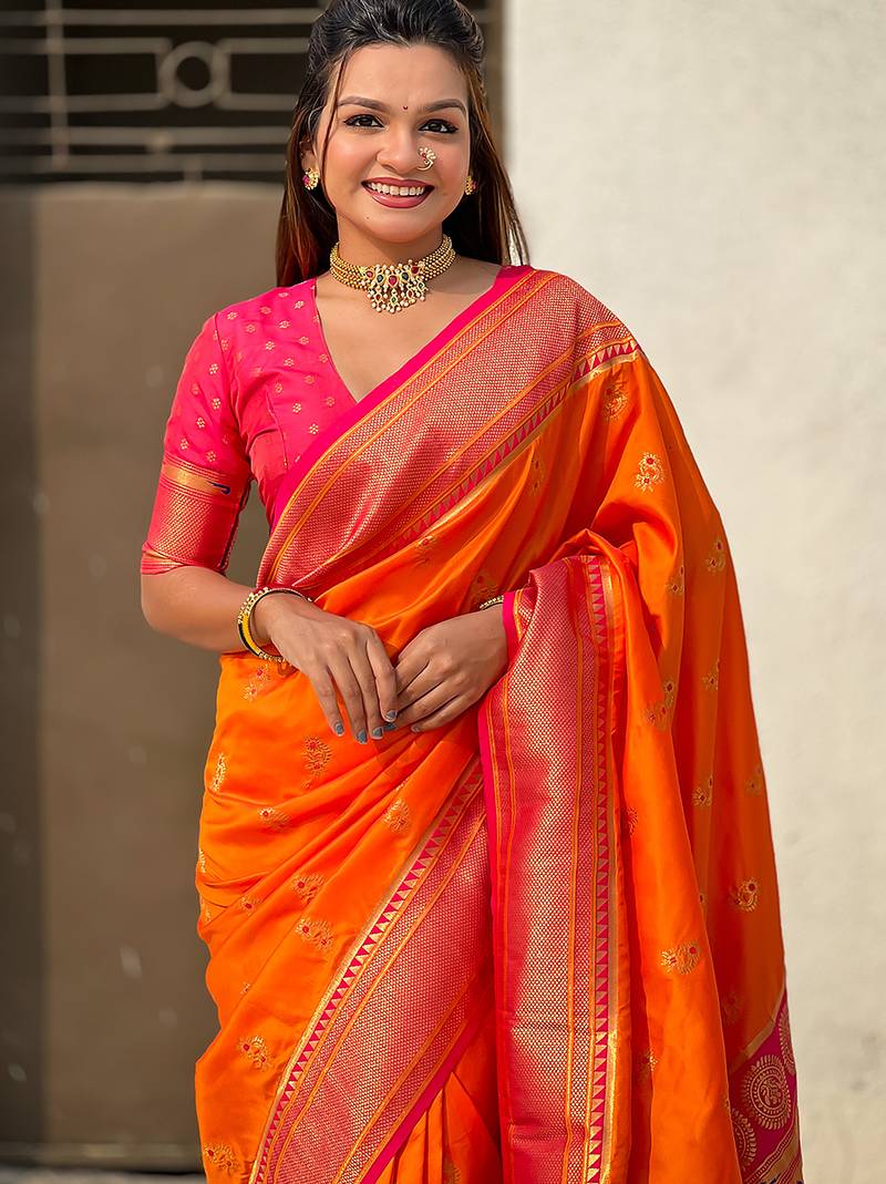 Orange woven self design pure silk paithani saree with blouse