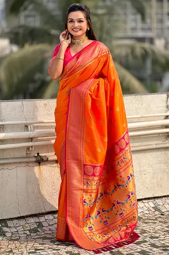 Orange woven self design pure silk paithani saree with blouse