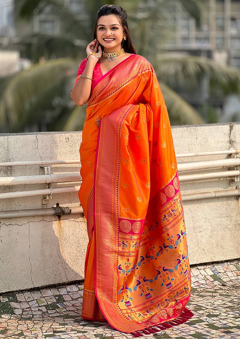 Orange woven self design pure silk paithani saree with blouse