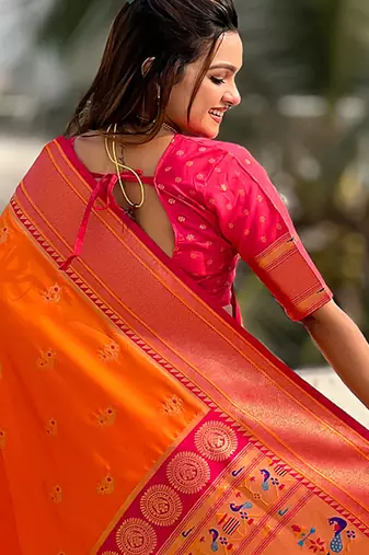Orange woven self design pure silk paithani saree with blouse