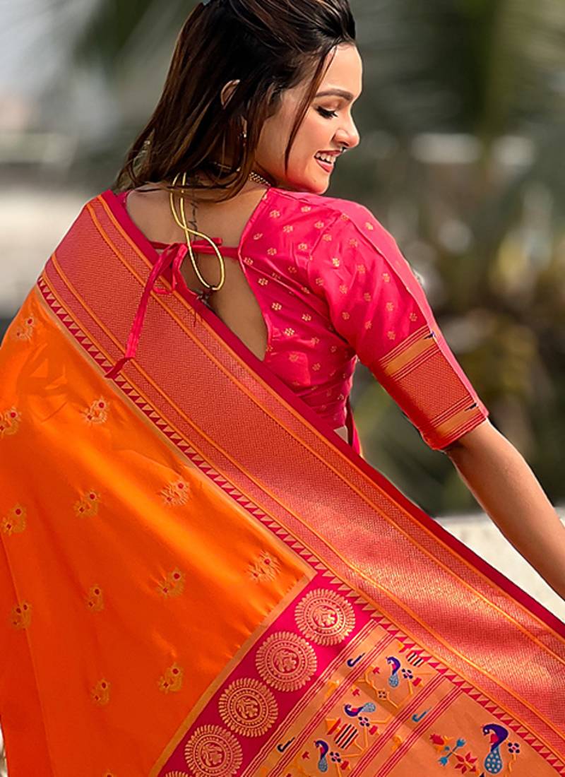 Orange woven self design pure silk paithani saree with blouse