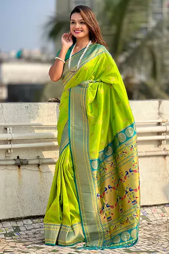 Parrot green woven self design pure silk paithani saree with blouse