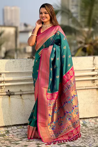 Teal green woven self design pure silk paithani saree with blouse